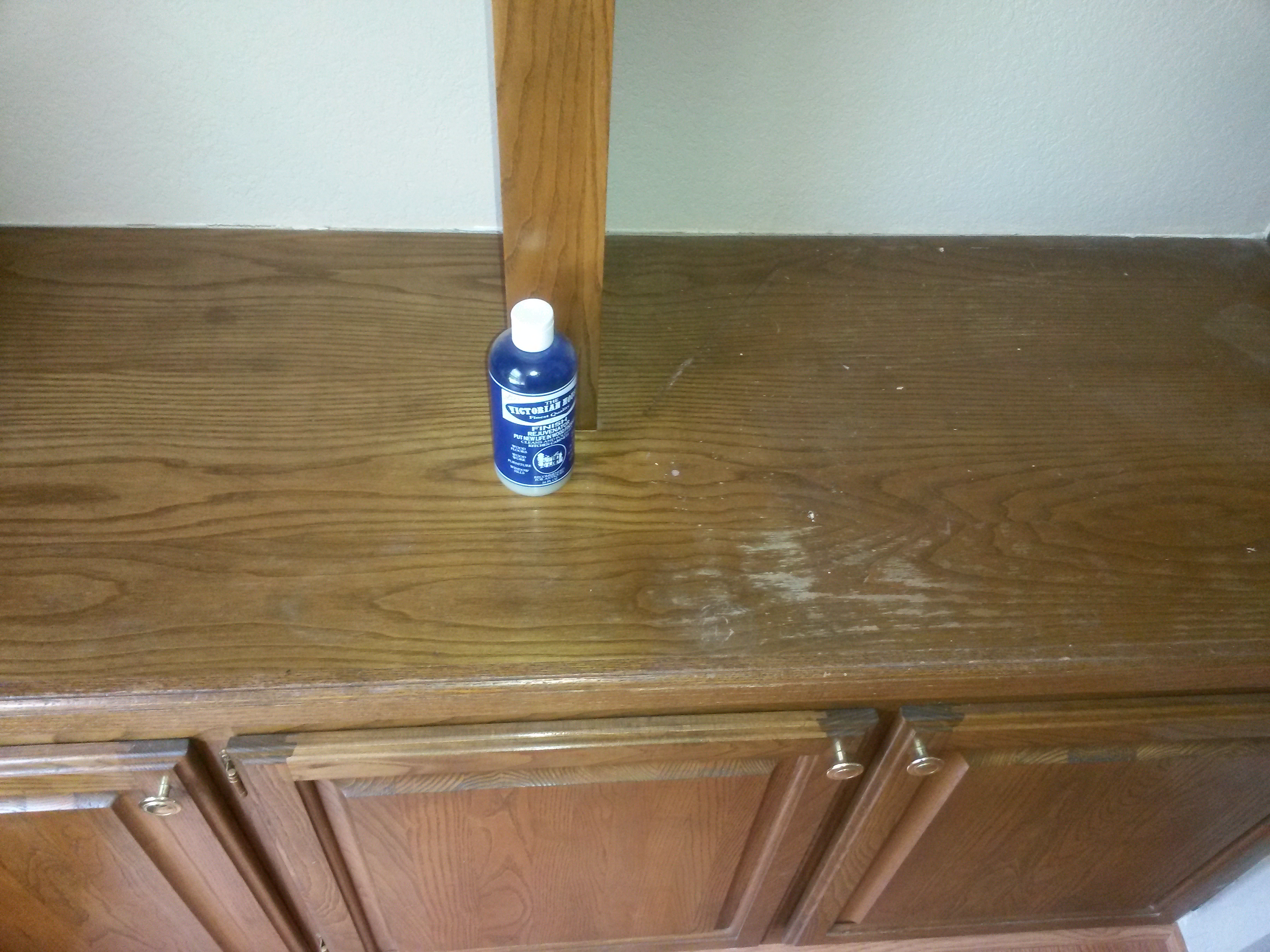 white-ring-gone-with-kitchen-cabinet-cleaner-bottle.jpg
